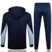 Le survêtement avec capuche et les pantalons de l'équipe de France pour la saison 2024/25 - bleu foncé.