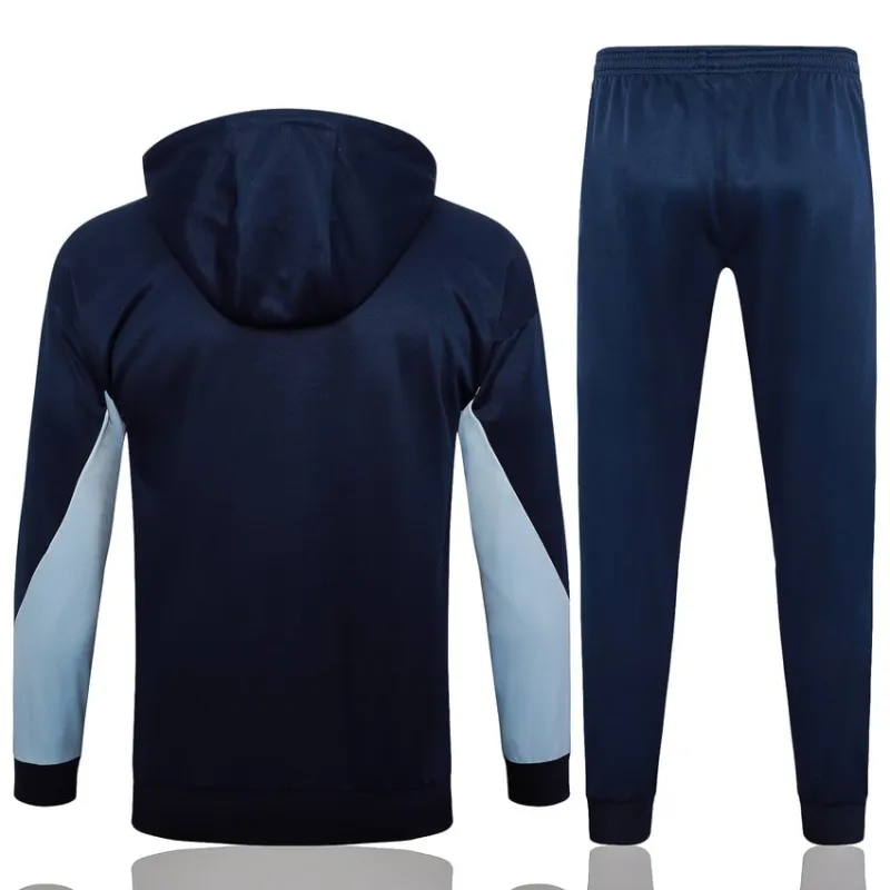 Le survêtement avec capuche et les pantalons de l'équipe de France pour la saison 2024/25 - bleu foncé.