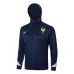 Le survêtement avec capuche et les pantalons de l'équipe de France pour la saison 2024/25 - bleu foncé.