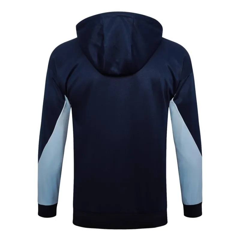 Le survêtement avec capuche et les pantalons de l'équipe de France pour la saison 2024/25 - bleu foncé.