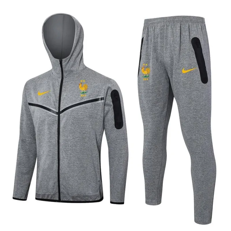 Die kapuzenhaltige Sportkleidung und die Hosen der französischen Nationalmannschaft für die Saison 2024/25 - grau.